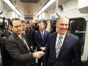 Governor Jay Inslee rides Link
