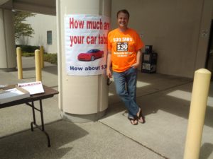 Tim Eyman hawking I-947 petitions