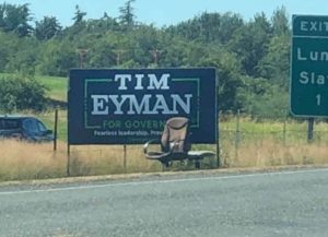 Tim Eyman campaign sign with abandoned chair